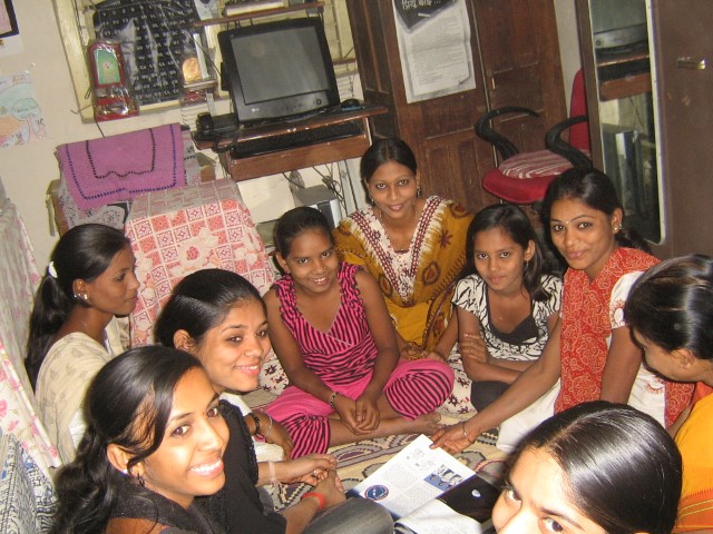 Nachiket community members with computer